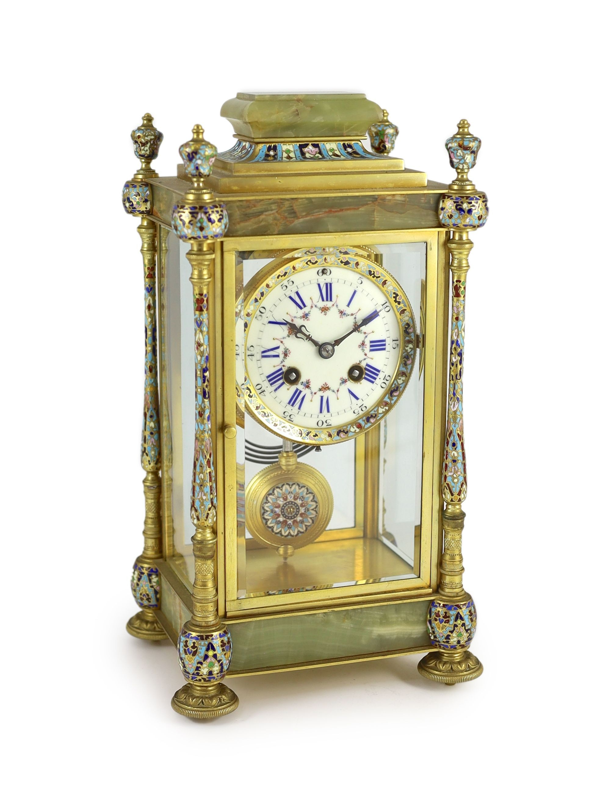 An early 20th century French ormolu and champleve enamel four glass mantel clock, width 18cm, depth 15cm, height 34cm